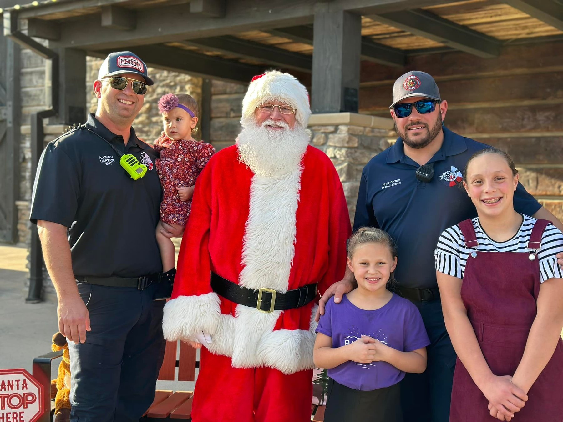 Members bring Santa to a community Christmas event